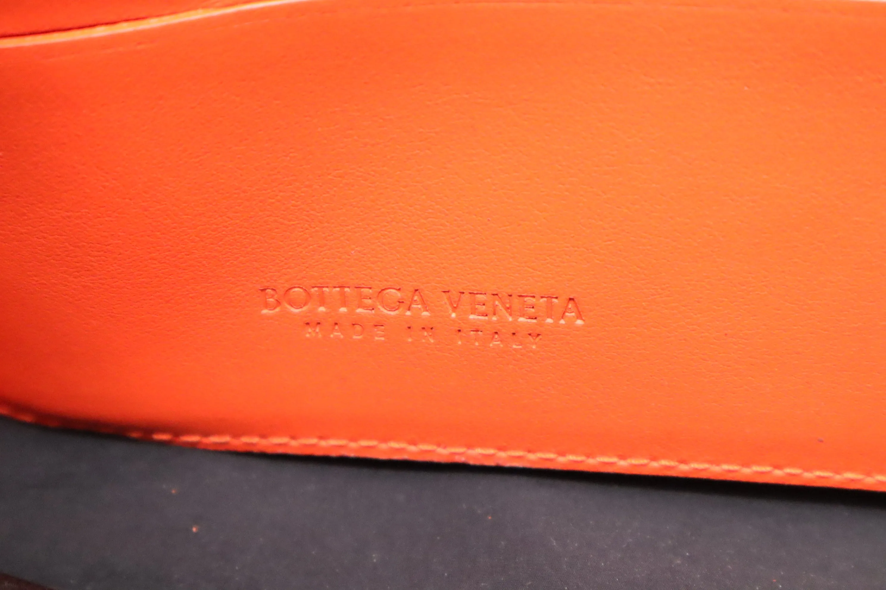 Bottega Veneta Maxi Clutch in Orange Intrecciato Leather