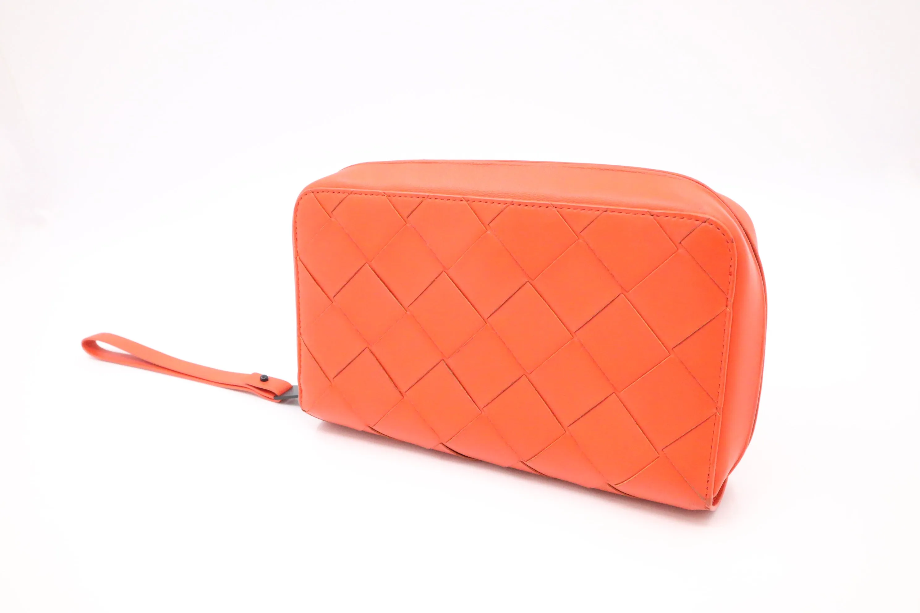 Bottega Veneta Maxi Clutch in Orange Intrecciato Leather