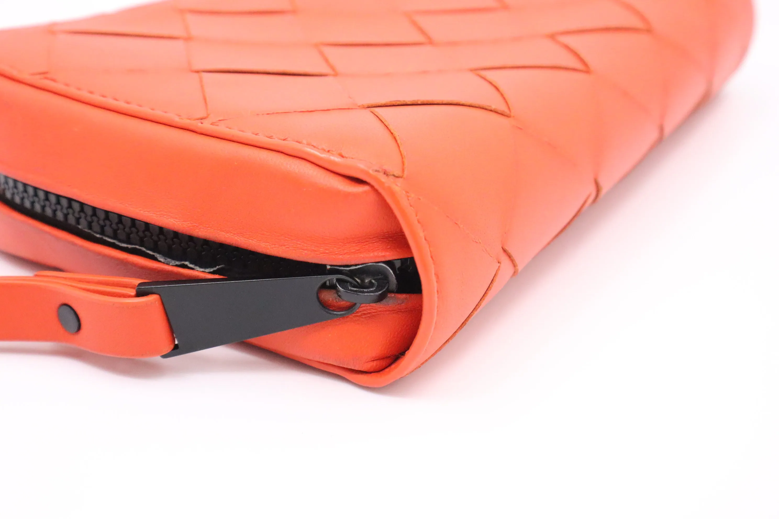 Bottega Veneta Maxi Clutch in Orange Intrecciato Leather