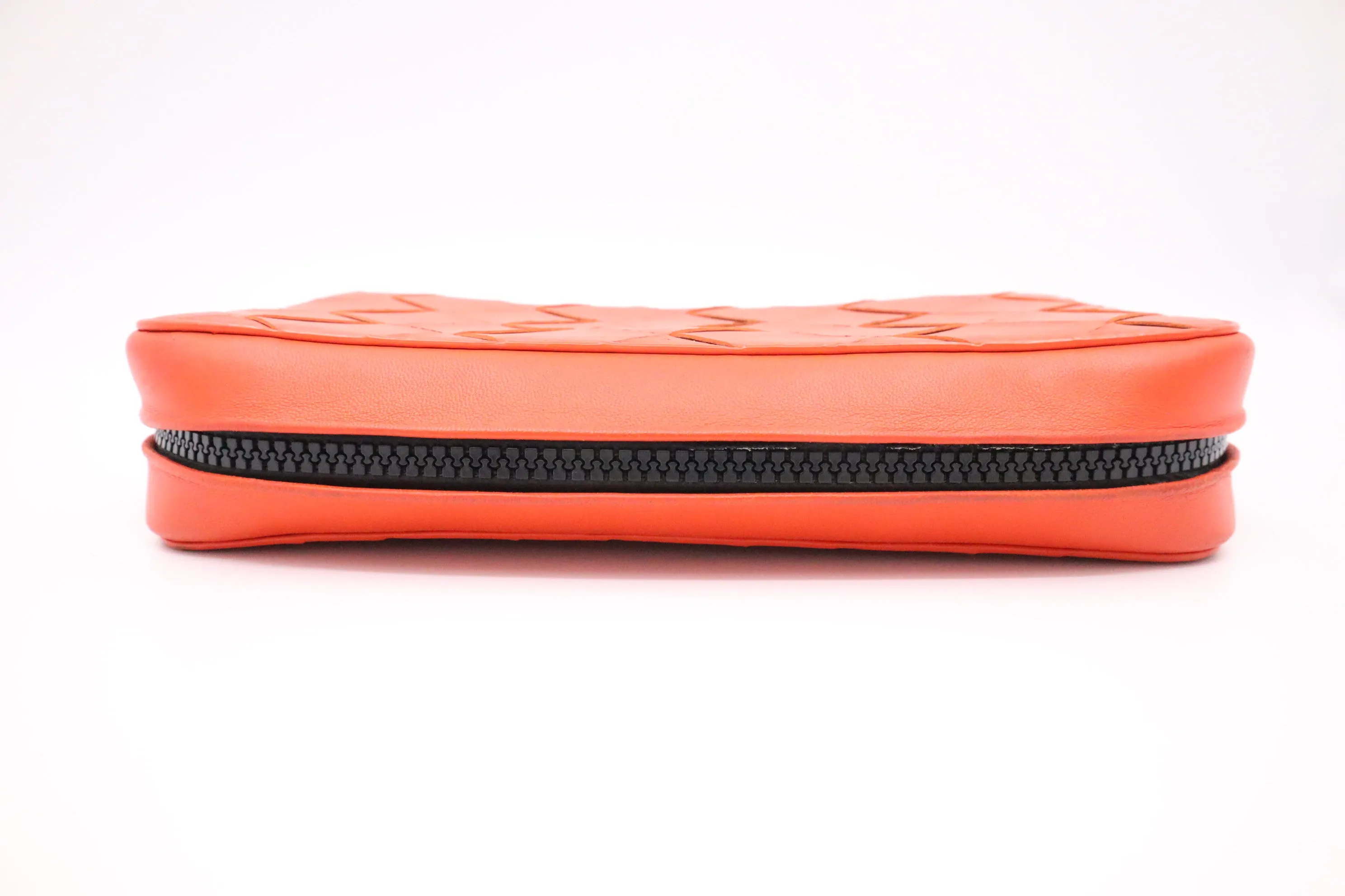 Bottega Veneta Maxi Clutch in Orange Intrecciato Leather