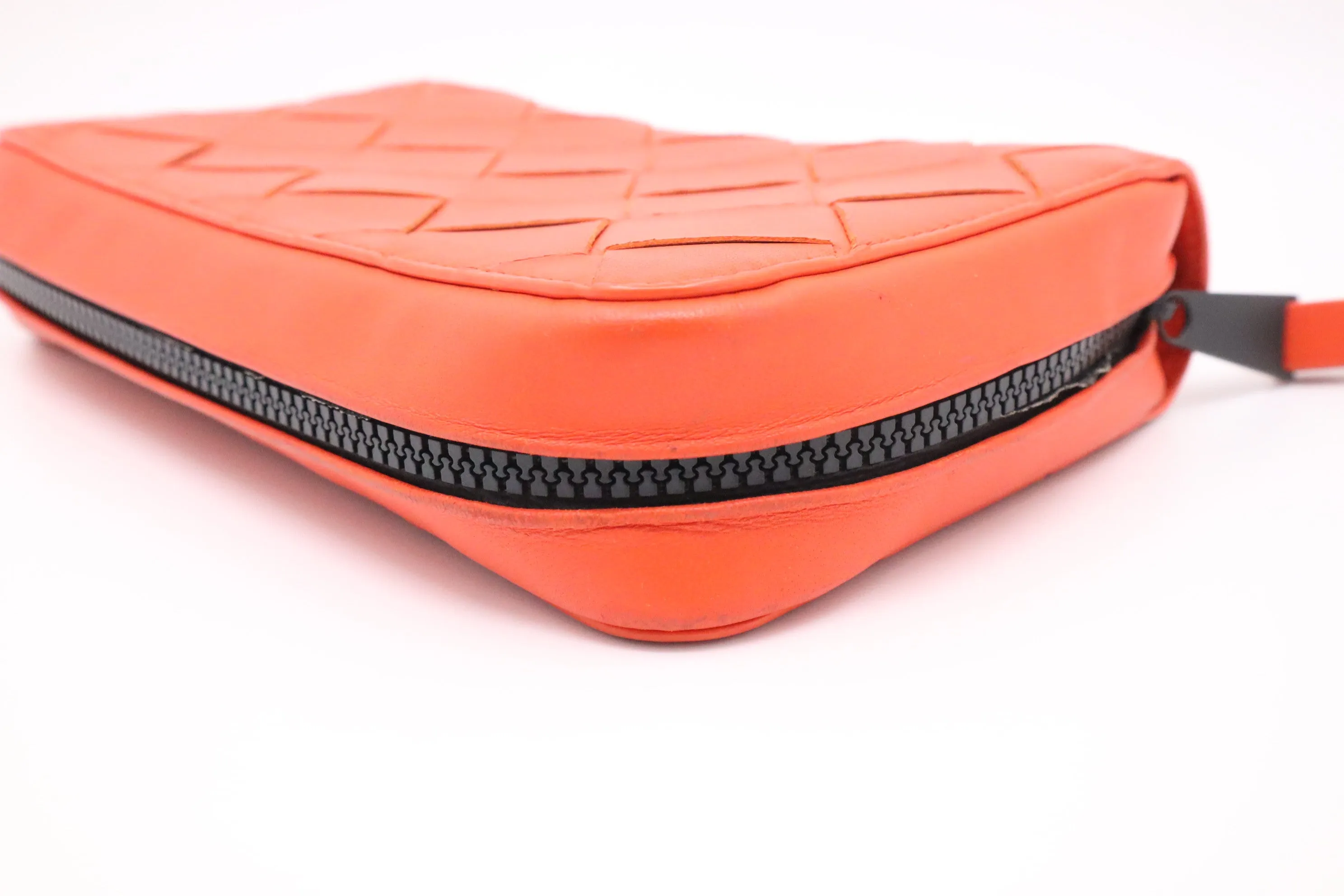 Bottega Veneta Maxi Clutch in Orange Intrecciato Leather