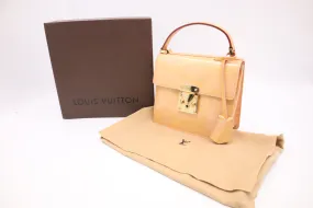 Louis Vuitton Spring Street in Peach Vernis Leather