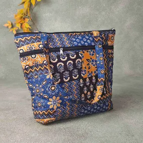 Medium Size Handbag Blue Colour with Multicolour Design Prints.